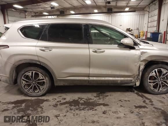 2019 Hyundai Santa Fe Limited z VIN 5NMS5CAA0KH110245, wystawiony jako IAAI lot #41626303 z przebiegiem 86 992 mil mil oraz . Historia ofert i sprzedaży dostępna na DreamBid. Obrazek 13.