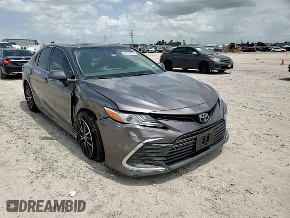 2022 Toyota Camry XLE z VIN 4T1F11AK6NU065671, wystawiony jako Copart lot #60124035 z przebiegiem 87 295 mil mil oraz Szkoda całkowita • Salvage title. Historia ofert i sprzedaży dostępna na DreamBid. Obrazek 13.