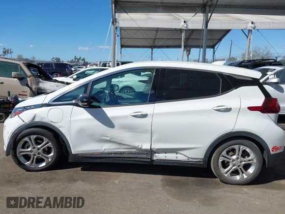 ✅ 2018 Chevrolet Bolt EV LT • VIN: 1G1FW6S09J4131763 • Lot: 41703138. Wystawiony na IAAI z przebiegiem 65 822 mil. Bezpłatny archiwum sprzedaży aukcyjnych z USA i szczegółowy raport historii pojazdu na DreamBid. Zdjęcie 14.