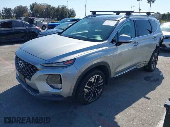 ✅ 2020 Hyundai Santa Fe Limited • VIN: 5NMS5CAA0LH186839 • Лот: 41981573. Опубликован ранее на IAAI с пробегом 68 751 миль. Бесплатный доступ к архиву аукционных продаж из США и подробный отчёт об истории автомобиля на DreamBid. Изображение 17.