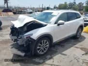 ✅ 2019 Mazda CX-9 Grand Touring • VIN: JM3TCADY3K0307375 • Lot: 42159412. Wystawiony na IAAI z przebiegiem 121 265 mil. Bezpłatny archiwum sprzedaży aukcyjnych z USA i szczegółowy raport historii pojazdu na DreamBid. Zdjęcie 2.