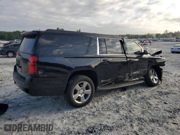 2020 Chevrolet Suburban LS z VIN 1GNSCGKC5LR306893, wystawiony jako Copart lot #65370435 z przebiegiem 34 372 mil mil oraz Szkoda całkowita • Salvage title. Historia ofert i sprzedaży dostępna na DreamBid. Obrazek 3.
