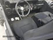 ✅ 1986 Jeep CJ • VIN: 1JCCM87E9GT012320 • Lot: 76745944. Wystawiony na Copart z przebiegiem 185 443 mil. Bezpłatny archiwum sprzedaży aukcyjnych z USA i szczegółowy raport historii pojazdu na DreamBid. Zdjęcie 8.