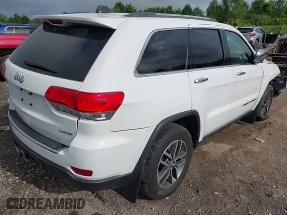 2018 Jeep Grand Cherokee Sterling z VIN 1C4RJFBG1JC489610, wystawiony jako IAAI lot #42689926 z przebiegiem 107 763 mil mil oraz . Historia ofert i sprzedaży dostępna na DreamBid. Obrazek 4.