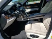 ✅ 2014 BMW 7 Series 750i • VIN: WBAYA8C59ED825103 • Lot: 66286145. Wystawiony na Copart z przebiegiem 127 567 mil. Bezpłatny archiwum sprzedaży aukcyjnych z USA i szczegółowy raport historii pojazdu na DreamBid. Zdjęcie 7.