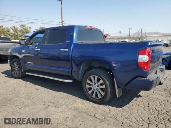 ✅ 2015 Toyota Tundra Limited • VIN: 5TFFY5F14FX180888 • Lot: 68292055. Listed on Copart with 104,908 mi. Free auction sales archive from the USA and detailed vehicle history report at DreamBid. Image 2.