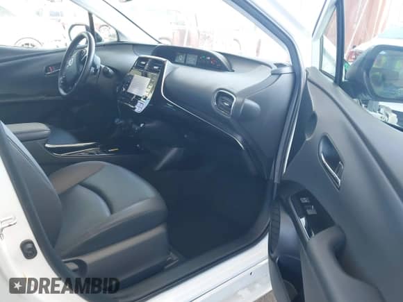 2021 Toyota Prius L Eco with VIN JTDKAMFU4M3134943, listed as a IAAI auction lot 43175713 with 106,611 mi miles and . Bid and sale history available at DreamBid. Image 5.