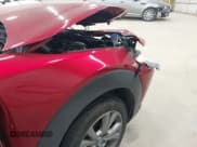 ✅ 2022 Mazda CX-30 S Premium • VIN: 3MVDMBDL0NM412458 • Lot: 43196761. Wystawiony na IAAI z przebiegiem 24 089 mil. Bezpłatny archiwum sprzedaży aukcyjnych z USA i szczegółowy raport historii pojazdu na DreamBid. Zdjęcie 19.
