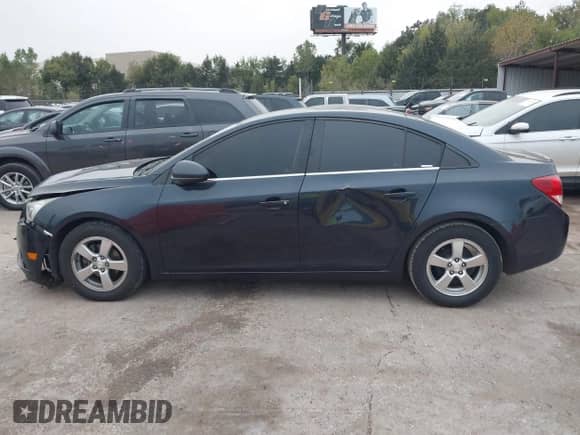 2014 Chevrolet Cruze 1LT with VIN 1G1PC5SB0E7242148, listed as a IAAI auction lot 43401415 with 206,878 mi miles and . Bid and sale history available at DreamBid. Image 14.