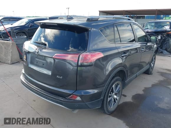 ✅ 2018 Toyota RAV4 XLE • VIN: JTMWFREV0JJ185602 • Lot: 43468504. Listed on IAAI with 113,161 mi. Free auction sales archive from the USA and detailed vehicle history report at DreamBid. Image 4.