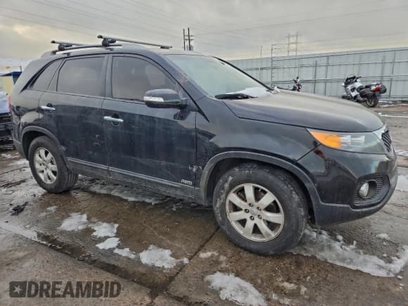 ✅ 2012 Kia Sorento LX • VIN: 5XYKTDA60CG300128 • Lot: 95760925. Listed on Copart with 165,471 mi. Free auction sales archive from the USA and detailed vehicle history report at DreamBid. Image 4.