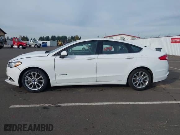 ✅ 2017 Ford Fusion Hybrid SE • VIN: 3FA6P0LU6HR355406 • Lot: 43581175. Listed on IAAI with 112,942 mi. Free auction sales archive from the USA and detailed vehicle history report at DreamBid. Image 15.