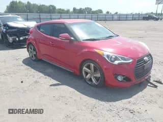 2014 Hyundai Veloster Turbo с VIN KMHTC6AEXEU198681, выставлен на аукционе IAAI как лот 42790364 с пробегом 126 308 миль миль и . История ставок и продаж доступна на DreamBid. Изображение 1.