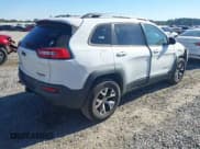✅ 2014 Jeep Cherokee Trailhawk • VIN: 1C4PJMBS9EW239763 • Lot: 43613520. Listed on IAAI with 122,929 mi. Free auction sales archive from the USA and detailed vehicle history report at DreamBid. Image 4.