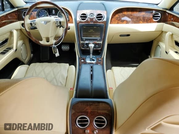 ✅ 2015 Bentley Flying Spur V8 • VIN: SCBET9ZA6F8048113 • Лот: 67754744. Опубликован ранее на Copart с пробегом 70 342 миль. Бесплатный доступ к архиву аукционных продаж из США и подробный отчёт об истории автомобиля на DreamBid. Изображение 8.