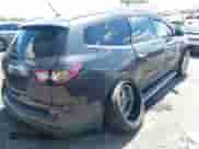 2014 Chevrolet Traverse LT z VIN 1GNKRGKD6EJ290499, wystawiony jako IAAI lot #42604884 z przebiegiem 169 701 mil mil oraz . Historia ofert i sprzedaży dostępna na DreamBid. Obrazek 4.