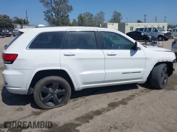 ✅ 2015 Jeep Grand Cherokee Altitude • VIN: 1C4RJEAG4FC860407 • Lot: 42528138. Listed on IAAI with 147,034 mi. Free auction sales archive from the USA and detailed vehicle history report at DreamBid. Image 13.