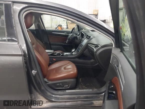 ✅ 2015 Ford Fusion Titanium • VIN: 3FA6P0D98FR116771 • Лот: 43478012. Опубликован ранее на IAAI с пробегом 143 550 миль. Бесплатный доступ к архиву аукционных продаж из США и подробный отчёт об истории автомобиля на DreamBid. Изображение 5.