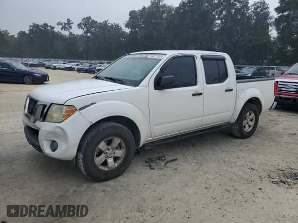 2012 Nissan Frontier SV with VIN 1N6AD0ER2CC433304, listed as a Copart auction lot 86213285 with 261,849 mi miles and Salvage title. Bid and sale history available at DreamBid. Image 1.