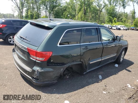 ✅ 2011 Jeep Grand Cherokee Laredo • VIN: 1J4RR4GG4BC673652 • Lot: 60517935. Listed on Copart with 93,468 mi. Free auction sales archive from the USA and detailed vehicle history report at DreamBid. Image 3.