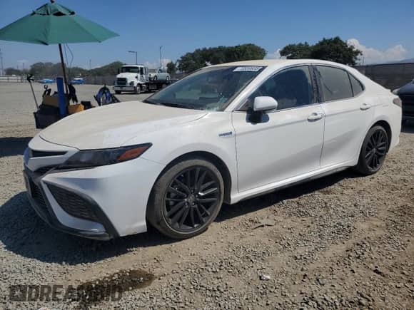 2021 Toyota Camry Hybrid SE с VIN 4T1G31AK6MU028794, выставлен на аукционе Copart как лот 70559935 с пробегом Не указан миль и Чистый • Clean title. История ставок и продаж доступна на DreamBid. Изображение 1.