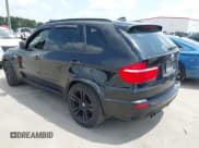 ✅ 2010 BMW X5 M • VIN: 5YMGY0C51ALK25937 • Lot: 42741850. Listed on IAAI with 117,720 mi. Free auction sales archive from the USA and detailed vehicle history report at DreamBid. Image 3.
