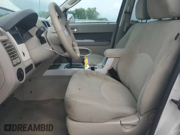 2011 Mercury Mariner z VIN 4M2CN8B71BKJ01749, wystawiony jako Copart lot #64199345 z przebiegiem 157 001 mil mil oraz Szkoda całkowita • Salvage title. Historia ofert i sprzedaży dostępna na DreamBid. Obrazek 7.