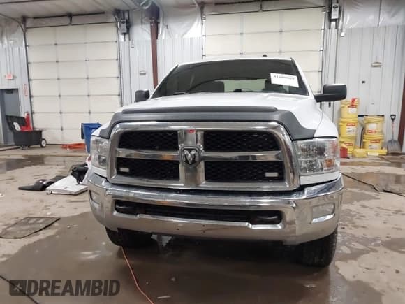 ✅ 2018 Ram 2500 SLT • VIN: 3C6TR5DTXJG284102 • Lot: 41609869. Listed on IAAI with 148,869 mi. Free auction sales archive from the USA and detailed vehicle history report at DreamBid. Image 13.