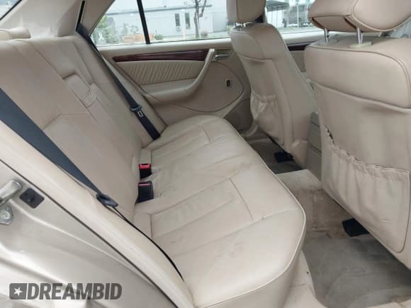 ✅ 1999 Mercedes-Benz C 230/260/280/320 • VIN: WDBHA29G8XA784619 • Lot: 42120920. Listed on IAAI with 49,387 mi. Free auction sales archive from the USA and detailed vehicle history report at DreamBid. Image 8.