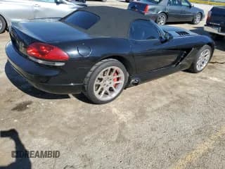 ✅ 2004 Dodge Viper SRT-10 • VIN: 1B3JZ65Z44V101704 • Lot: 71448694. Listed on Copart with 62,624 mi. Free auction sales archive from the USA and detailed vehicle history report at DreamBid. Image 3.
