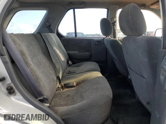 ✅ 2000 Isuzu Rodeo • VIN: 4S2DM58WXY4336906 • Lot: 69639245. Wystawiony na Copart z przebiegiem 176 214 mil. Bezpłatny archiwum sprzedaży aukcyjnych z USA i szczegółowy raport historii pojazdu na DreamBid. Zdjęcie 11.