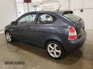 2010 Hyundai Accent SE z VIN KMHCN3AC5AU154590, wystawiony jako Copart lot #85150054 z przebiegiem 115 376 mil mil oraz Szkoda całkowita • Salvage title. Historia ofert i sprzedaży dostępna na DreamBid. Obrazek 2.