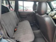 ✅ 1999 Jeep Cherokee Sport • VIN: 1J4FF68S4XL583029 • Lot: 52030175. Listed on Copart with 294,502 mi. Free auction sales archive from the USA and detailed vehicle history report at DreamBid. Image 11.