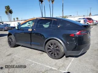 ✅ 2022 Tesla Model X Plaid • VIN: 7SAXCBE66NF332583 • Lot: 39695023. Listed on Copart with Not provided. Free auction sales archive from the USA and detailed vehicle history report at DreamBid. Image 2.