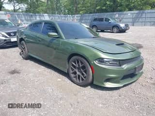 2018 Dodge Charger R/T with VIN 2C3CDXCT1JH251174, listed as a IAAI auction lot 42610749 with 111,893 mi miles and . Bid and sale history available at DreamBid. Image 1.