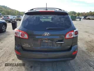 2012 Hyundai Santa Fe Limited с VIN 5XYZKDAG3CG151479, выставлен на аукционе Copart как лот 74742144 с пробегом 156 598 миль миль и Списание • Salvage title. История ставок и продаж доступна на DreamBid. Изображение 6.