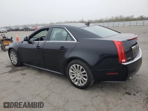 ✅ 2013 Cadillac CTS Premium • VIN: 1G6DP5E37D0143159 • Lot: 85570024. Listed on Copart with 102,743 mi. Free auction sales archive from the USA and detailed vehicle history report at DreamBid. Image 2.