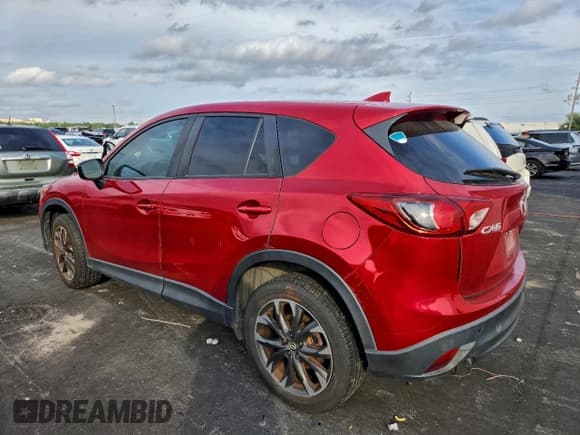 ✅ 2016 Mazda CX-5 Grand Touring • VIN: JM3KE2DYXG0772206 • Lot: 95505335. Listed on Copart with 106,791 mi. Free auction sales archive from the USA and detailed vehicle history report at DreamBid. Image 2.