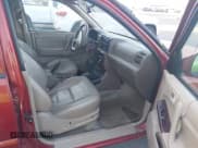 ✅ 2001 Isuzu Rodeo S • VIN: 4S2CK58W414308980 • Lot: 42496432. Listed on IAAI with 166,360 mi. Free auction sales archive from the USA and detailed vehicle history report at DreamBid. Image 5.