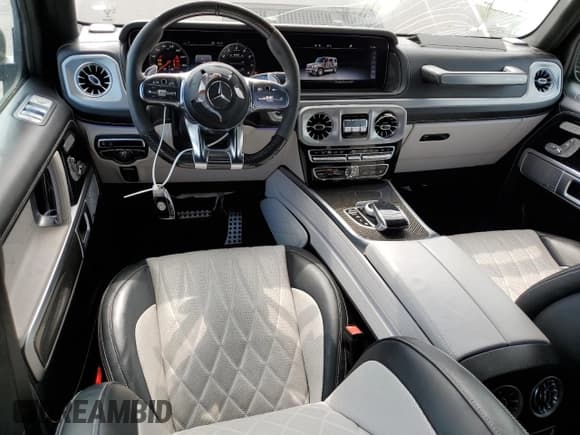 ✅ 2021 Mercedes-Benz G 63 AMG • VIN: W1NYC7HJ8MX392764 • Lot: 55893784. Wystawiony na Copart z przebiegiem 33 008 mil. Bezpłatny archiwum sprzedaży aukcyjnych z USA i szczegółowy raport historii pojazdu na DreamBid. Zdjęcie 8.