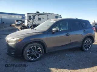 ✅ 2016 Mazda CX-5 Grand Touring • VIN: JM3KE4DY4G0829205 • Lot: 91416535. Listed on Copart with 98,862 mi. Free auction sales archive from the USA and detailed vehicle history report at DreamBid. Image 1.