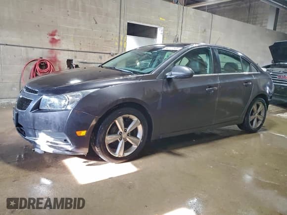 ✅ 2014 Chevrolet Cruze 2LT • VIN: 1G1PE5SBXE7308893 • Лот: 94127635. Опубликован ранее на Copart с пробегом 145 659 миль. Бесплатный доступ к архиву аукционных продаж из США и подробный отчёт об истории автомобиля на DreamBid. Изображение 1.