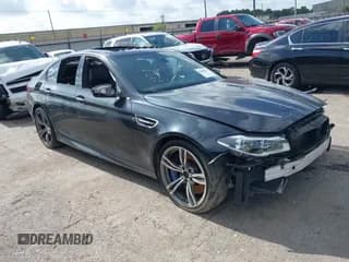 ✅ 2016 BMW M5 • VIN: WBSFV9C57GG343230 • Lot: 42488416. Listed on IAAI with 103,454 mi. Free auction sales archive from the USA and detailed vehicle history report at DreamBid. Image 1.
