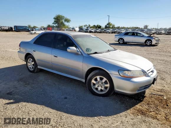 2002 Honda Accord EX z VIN JHMCG56642C007938, wystawiony jako Copart lot #91113885 z przebiegiem 214 242 mil mil oraz Czysty tytuł • Clean title. Historia ofert i sprzedaży dostępna na DreamBid. Obrazek 4.