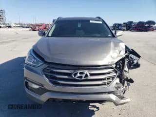 ✅ 2017 Hyundai Santa Fe 2.4L • VIN: 5XYZU3LB5HG422829 • Лот: 43413654. Опубликован ранее на Copart с пробегом 128 799 миль. Бесплатный доступ к архиву аукционных продаж из США и подробный отчёт об истории автомобиля на DreamBid. Изображение 5.