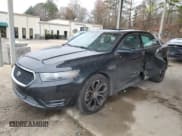 ✅ 2014 Ford Taurus SHO • VIN: 1FAHP2KT2EG107878 • Lot: 44894075. Listed on Copart with 103,472 mi. Free auction sales archive from the USA and detailed vehicle history report at DreamBid. Image 1.