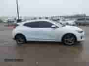 2019 Hyundai Veloster 2.0 z VIN KMHTG6AF7KU017934, wystawiony jako IAAI lot #41700835 z przebiegiem 50 594 mil mil oraz . Historia ofert i sprzedaży dostępna na DreamBid. Obrazek 13.