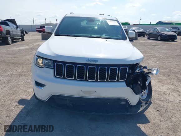 2021 Jeep Grand Cherokee Laredo E with VIN 1C4RJEAG1MC831072, listed as a IAAI auction lot 42993482 with 111,059 mi miles and . Bid and sale history available at DreamBid. Image 12.