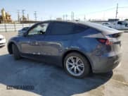 ✅ 2023 Tesla Model Y • VIN: 7SAYGDED7PF963865 • Lot: 69295755. Listed on Copart with 11,750 mi. Free auction sales archive from the USA and detailed vehicle history report at DreamBid. Image 2.