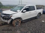 ✅ 2018 Honda Ridgeline RTL-E • VIN: 5FPYK3F77JB017293 • Lot: 42422614. Listed on IAAI with 87,700 mi. Free auction sales archive from the USA and detailed vehicle history report at DreamBid. Image 17.